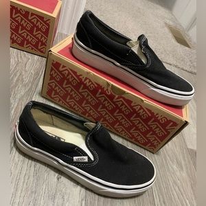 Black and white slip on vans